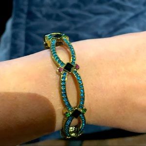 Colourful and sparkly bracelet. Hinged closure